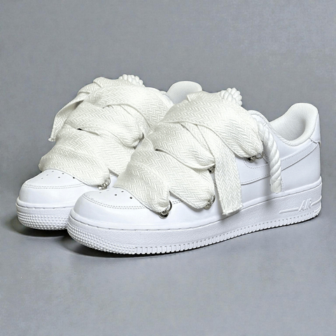 Side angle of Triple White NIke Air Force 1 with 1.0 white rope base and white Lanvin fat laces