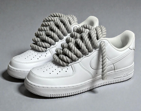 Nike Air Force 1 Triple White upgraded with 1.0 light grey cotton rope laces for a neutral, lush look.