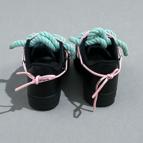 Top-down view showcasing the texture of 1.0 Tiffany Blue rope and pink "Off-White" style laces.