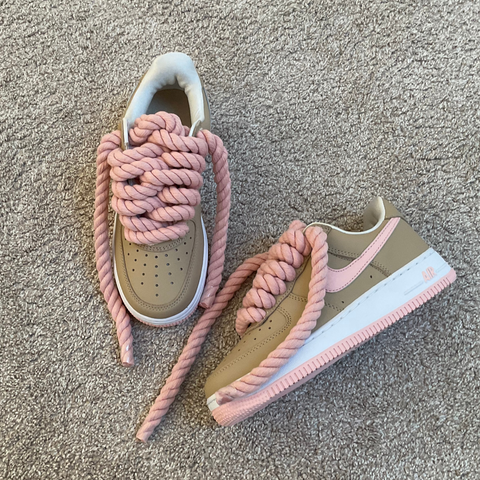 Overhead shot of the 1.0 version Air Force 1 custom with pink leather accents and high-quality rope lace