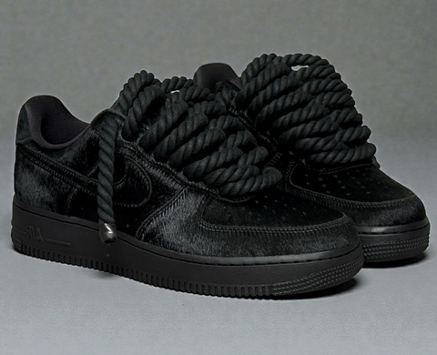 Side profile of all-black custom Air Force 1s featuring 1.0 black cotton rope laces and a faux fur upper.