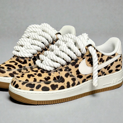Angled shot of a pair of Leopard Print AF1s showcasing the seamless integration of 1.0 white rope laces for a high-end custom look.