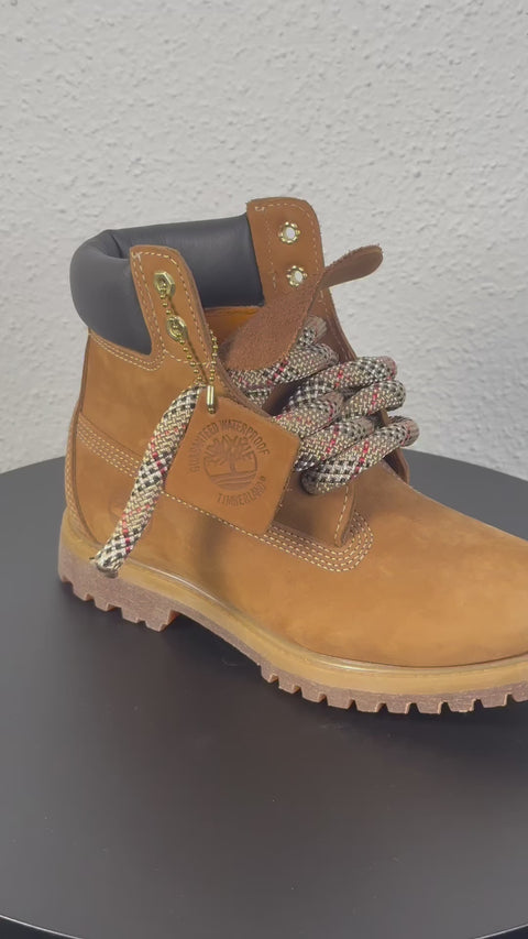 A 360-degree video showcase of the wheat Timberland boots, highlighting the texture and waterproof finish of the 2.0 rope laces