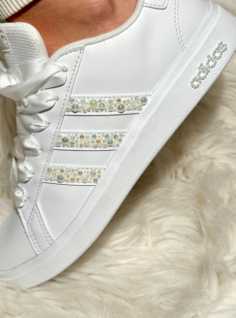 Pair of luxury custom Adidas Grand Court sneakers for weddings with crystal accents.
